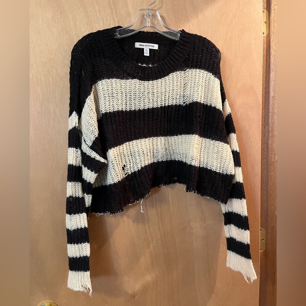 Distressed striped sweater